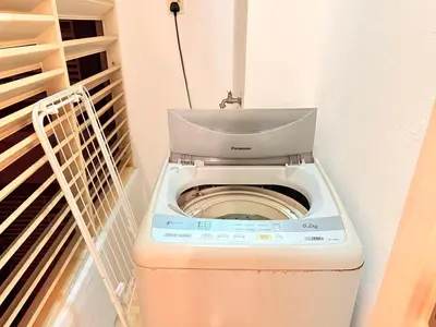 a small bathroom with a toilet in a room at CozyHome Suites Casa Mutiara in Kuala Lumpur