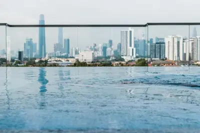 a large body of water with a city in the background at Ampang 2pax Studio Ampang Point in Ampang