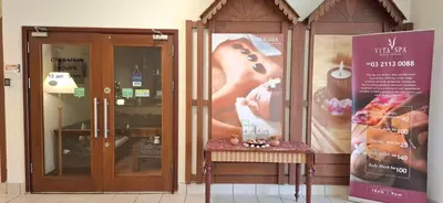 a store with a sign in front of a door at Relax Suite Times Square Kl in Kuala Lumpur