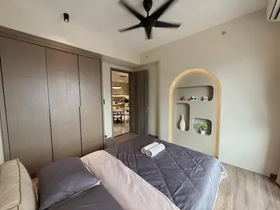 a bedroom with a bed and a ceiling fan at 3PX Deluxe Suites Agile Bukit Bintang, Walkable Pavilion & TRX & MRT in Kuala Lumpur