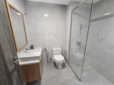 a bathroom with a shower and a toilet and a sink at City Haven Bukit Bintang,KLCC,Pavillion in Kuala Lumpur