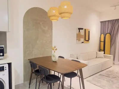 a living room with a table and a couch at City Haven Bukit Bintang,KLCC,Pavillion in Kuala Lumpur