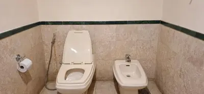 a bathroom with a toilet and a bidet at B Service apartment times Square kl in Kuala Lumpur