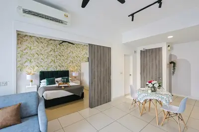 a living room with a bed and a table at Continew Residensi City Comfort Stay Cozy 1BR 1BA in Kuala Lumpur