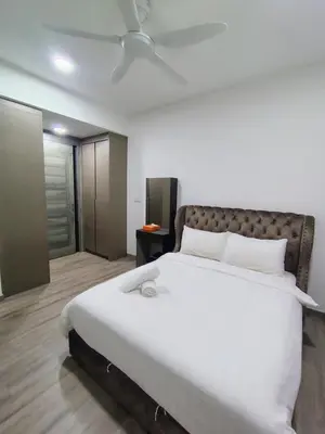 a bedroom with a large white bed with a ceiling at Agile Bukit Bintang TRX by AR in Kuala Lumpur