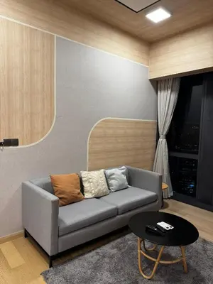 a living room with a couch and a table at Star residence in Kuala Lumpur