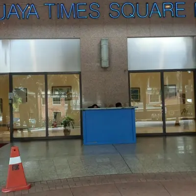 a blue counter in front of a store at Krish Apartment At Times Square in Kuala Lumpur