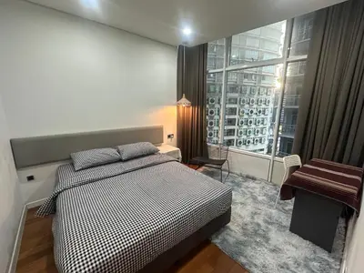 a bedroom with a bed and a large window at Z-Home-skysuite \u4e24\u623f\u4e24\u536b in Kuala Lumpur