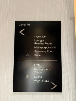 a black sign with a bunch of words on it at So Sofitel KL Residences in Kuala Lumpur
