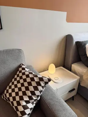 a living room with a couch and a table at Kampung Marsa Retreat, Majestic Residence, KL in Kuala Lumpur