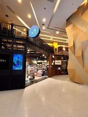 a store with a tv in the middle of a mall at 2 Bedroom Apartment Near KLCC 5 minutes Walk in Kuala Lumpur