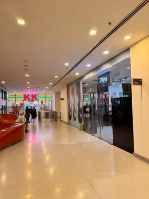 a shopping mall with a krispy kreme store at 2 Bedroom Apartment Near KLCC 5 minutes Walk in Kuala Lumpur