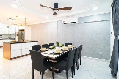 a dining room with a table and chairs at Seputeh 2Sty House - 10 min to MidValley KL Gateway Bangsar in Kuala Lumpur