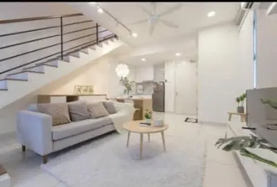 a living room with a couch and a table at BMC Arte Mont Kiara in Kuala Lumpur