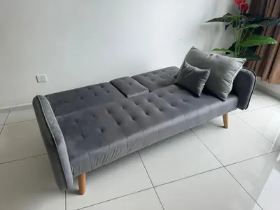 a black leather couch with two pillows on it at Robertson S15 KLCC Alor Street Bukit Bintang 5Pax in Kuala Lumpur