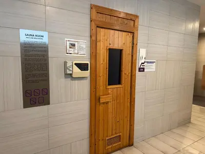 a wooden door on a wall in a room at Robertson S15 KLCC Alor Street Bukit Bintang 5Pax in Kuala Lumpur