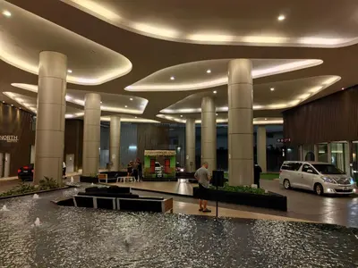 a man standing in the middle of a building at Robertson S15 KLCC Alor Street Bukit Bintang 5Pax in Kuala Lumpur