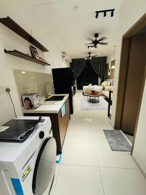 a kitchen with a washing machine and a living room at Majestic Residence Klcc by Apple in Kuala Lumpur