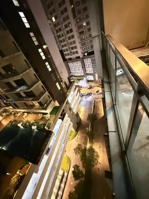 an overhead view of a city with tall buildings at CozyNest KLCC at Mercu Summer Suites in Kuala Lumpur