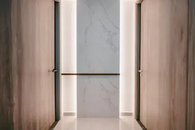 an empty room with a glass door at Cozy Minimalist Studio KL, Agile Residence Bukit Bintang in Kuala Lumpur