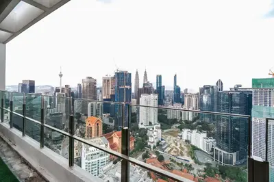 a view of the city from a skyscraper at Grand 2BR Agile Bukit Bintang BY RumaBnB in Kuala Lumpur