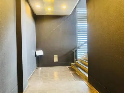 a hallway with stairs in a building at Fairlane Bukit Bintang by Lily in Kuala Lumpur