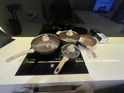 a group of pots and pans on top of a stove at KL Star Residance in Kuala Lumpur