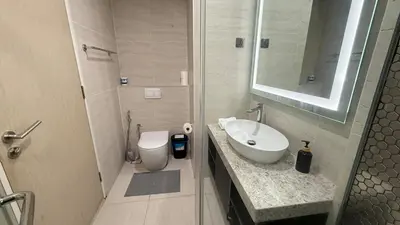 a bathroom with a sink and a toilet at KL Star Residence KLCC in Kuala Lumpur