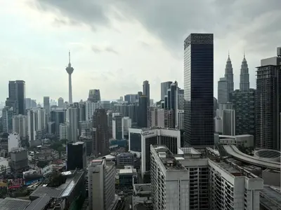 a view of a city skyline with tall buildings at Astra At Axon Bukit Bintang KL in Kuala Lumpur