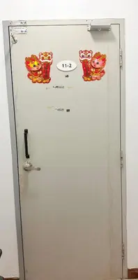 a door with hello kitty stickers on it at Happy Homes Kuala Lumpur Rooms in Kuala Lumpur