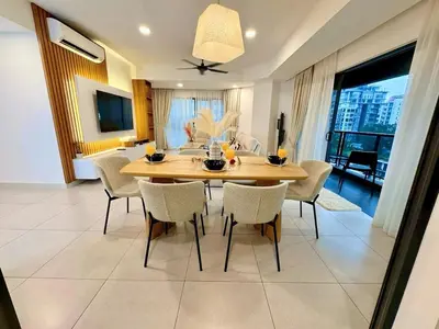 a dining room with a table and chairs at Premium Executive Family Suites 3Bedroom at The Atrium Ampang by OKBnB in Kuala Lumpur