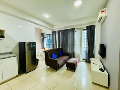 a living room with a couch and a chair at Arte Plus by Jerry in Kuala Lumpur