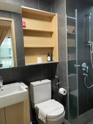 a bathroom with a toilet and a sink and a shower at Cheapest 2R2B in the Heart of KL in Kuala Lumpur