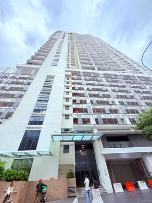 a tall building with people standing in front of it at THE Colony KL at Sky World in Kuala Lumpur