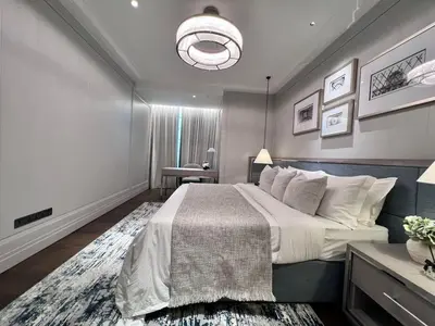 a large bedroom with a large bed and a table at Apartment Sixceylon City Centre in Kuala Lumpur