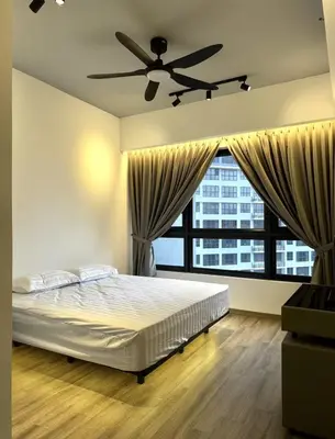 a bedroom with a bed and a large window at Friendly & Cozy Near TRX & Pavilion in Kuala Lumpur