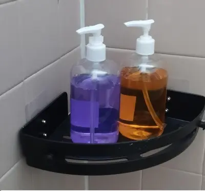 two bottles of soap sitting in a black holder at Segambut Homestay MITEC KLCC PWTC 13 paxs in Kuala Lumpur