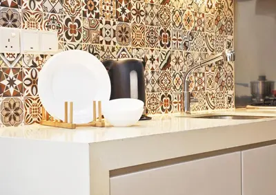 a kitchen counter with a sink and a mirror at Bukit Bintang Fairlane Residence #1810 Kuala Lumpur in Kuala Lumpur