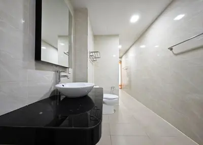 a bathroom with a sink and a toilet at Bukit Bintang Fairlane Residence #1810 Kuala Lumpur in Kuala Lumpur