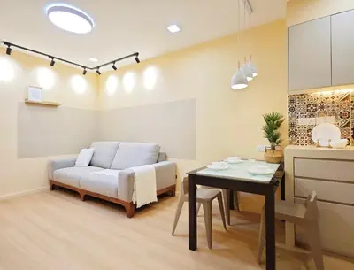 a living room with a couch and a table at Bukit Bintang Fairlane Residence #1810 Kuala Lumpur in Kuala Lumpur