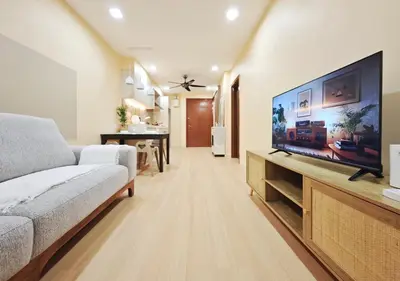a living room with a large flat screen tv at Bukit Bintang Fairlane Residence #1810 Kuala Lumpur in Kuala Lumpur