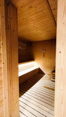 an inside of a wooden sauna with a wooden ceiling at Axon Residence Bukit Bintang Pavilion TRX by Fie in Kuala Lumpur
