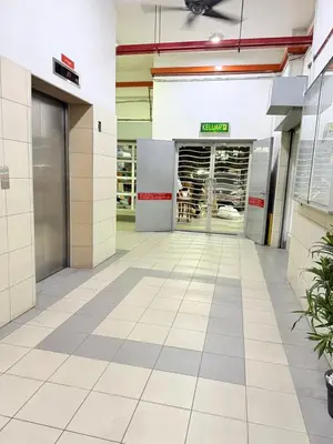 an empty lobby of a building with a store at Happy Homes Kuala Lumpur 21-12 in Kuala Lumpur