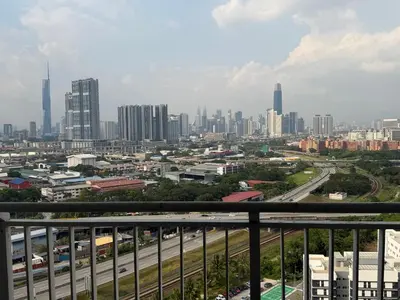 a view of a city from a balcony at Happy Homes Kuala Lumpur 21-12 in Kuala Lumpur