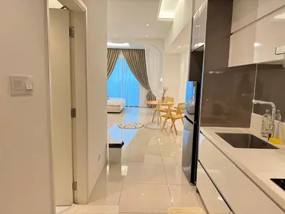 a kitchen with a sink and a table in a room at Dorsett Hartamas with Rooftop Pool and Bathtub in KL City #215 in Kuala Lumpur