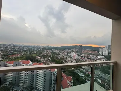 a view of a city from the balcony of a building at Dorsett Hartamas with Rooftop Pool and Bathtub in KL City #215 in Kuala Lumpur