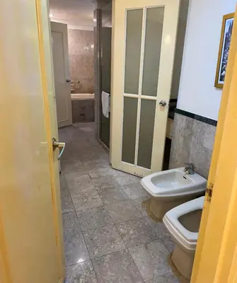 a bathroom with a toilet and a sink at Apartment TS at Times Square in Kuala Lumpur