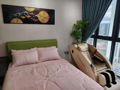 a bedroom with a pink bed and a window at KL Majestic VIP studio Massage Chair 26-1A KLCC view in Kuala Lumpur