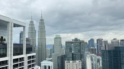 a view of a large city with tall buildings at The Platinum KLCC By Pool Point in Kuala Lumpur