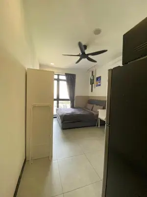 a living room with a ceiling fan and a bed at Neu Suites KLCC by HMM Home in Kuala Lumpur